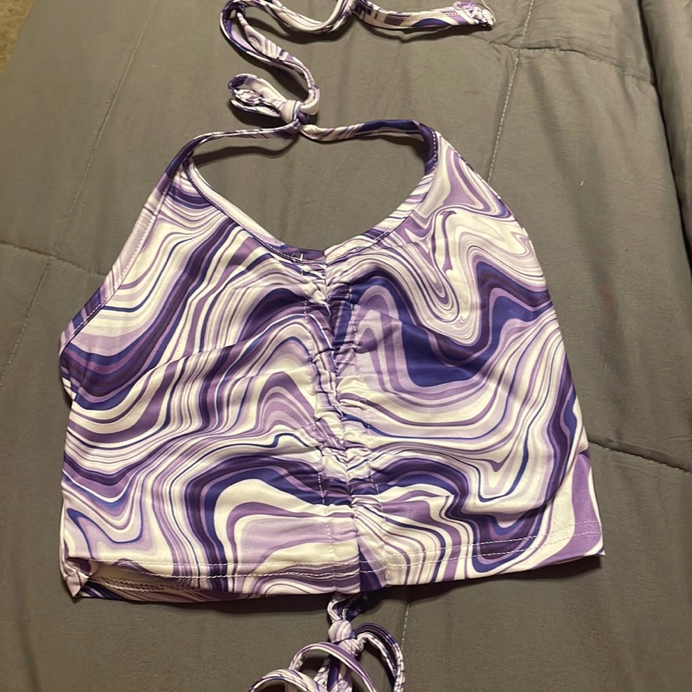 also has never been worn before